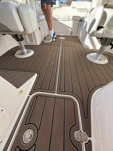 Tan teak GatorStep pontoon flooring around pedestal seat bases