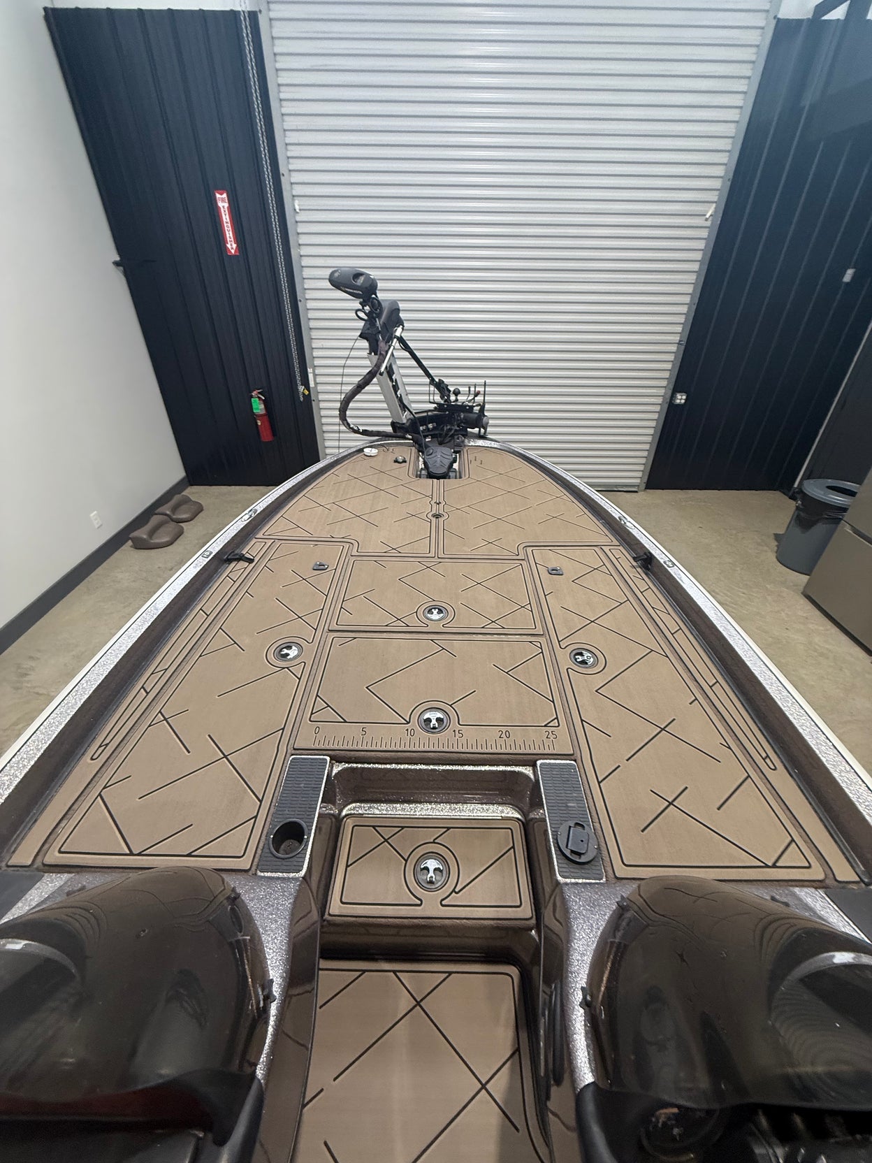 Tan custom GatorStep casting deck on a bass boat with trolling motor — Knoxville, TN