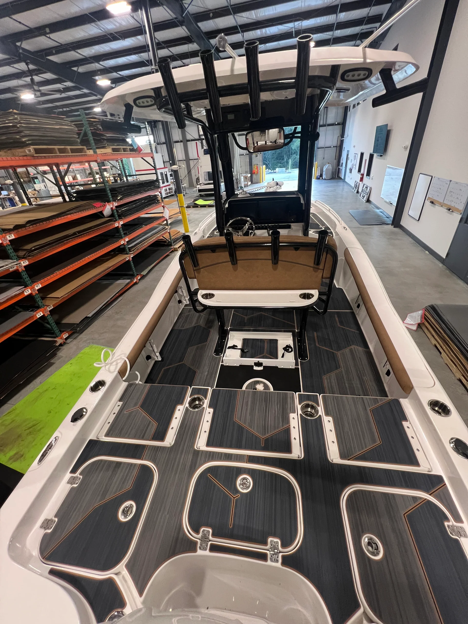 GatorStep deck panels being fitted on a boat in the Lenoir City shop