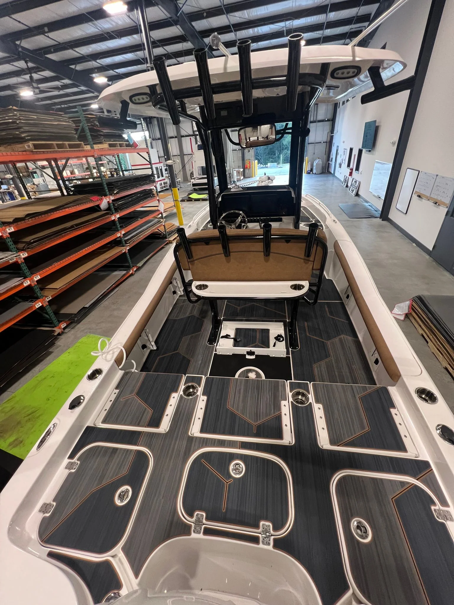 Dark gray GatorStep flooring with copper hex accents on a center console aft deck — Lakebound Marine, Lenoir City TN
