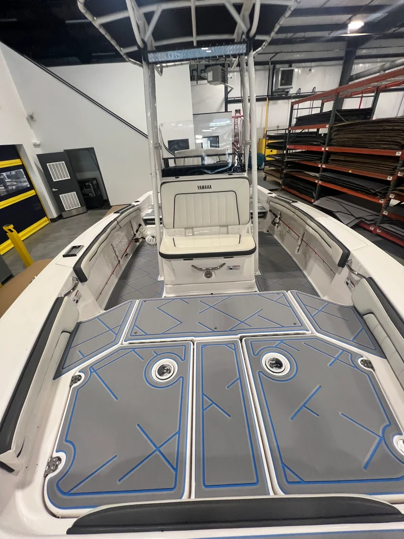 Gray and blue GatorStep front deck on a bass boat
