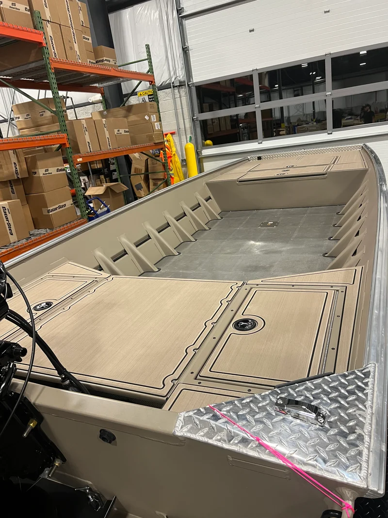 Long tan GatorStep deck section fitted in the shop