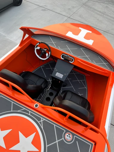 Custom GatorStep helm flooring on a Tennessee Vols themed orange boat