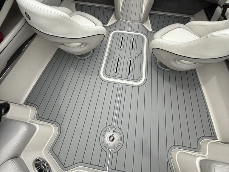 Gray GatorStep cockpit flooring with white bucket seats in a bowrider — Lakebound Marine, Knoxville TN