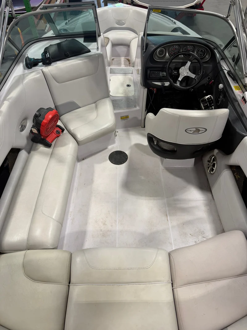 Before: bare factory cockpit floor in a Centurion wakeboat, ahead of a custom GatorStep flooring install — Lakebound Marine, Lenoir City TN