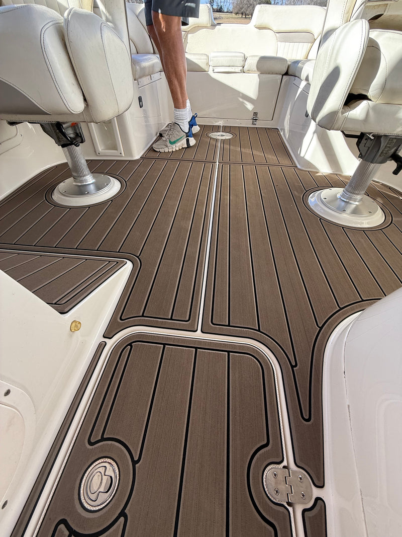 Tan teak GatorStep pontoon flooring around pedestal seat bases