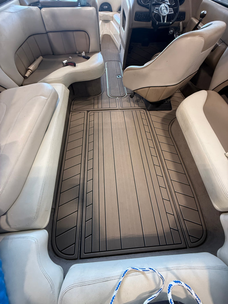 Dark teak GatorStep flooring on a pontoon rear lounge