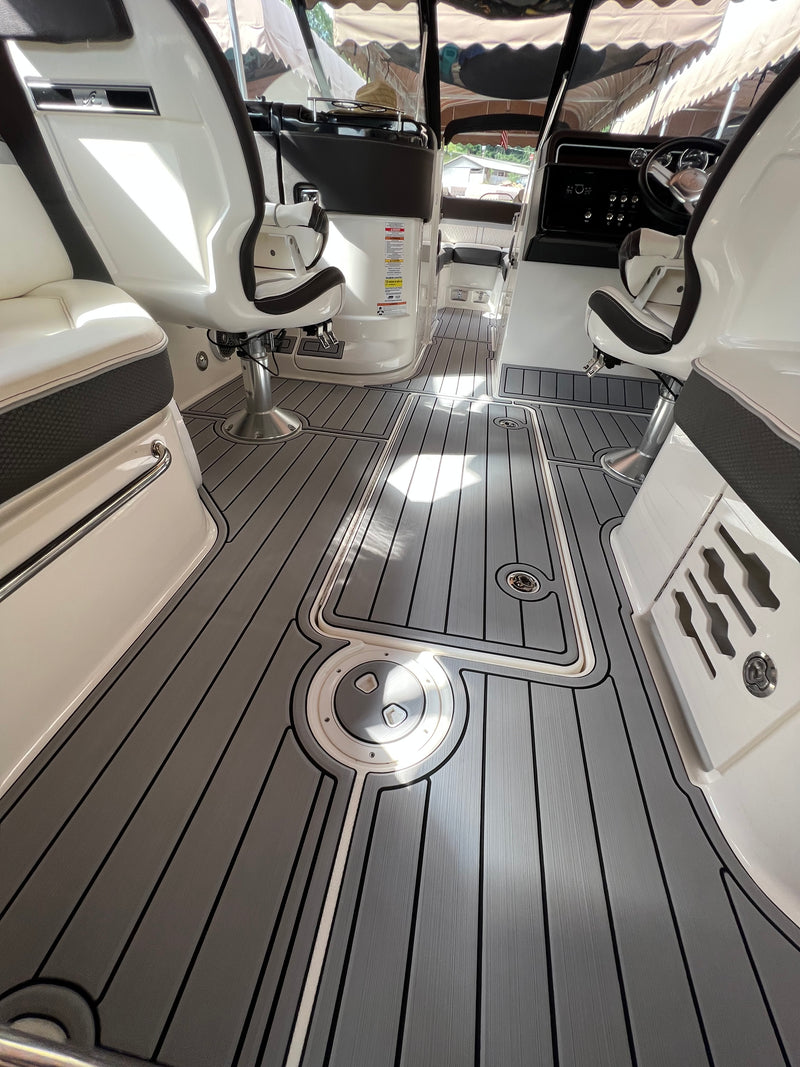Dark teak GatorStep cockpit flooring with fish ruler detail