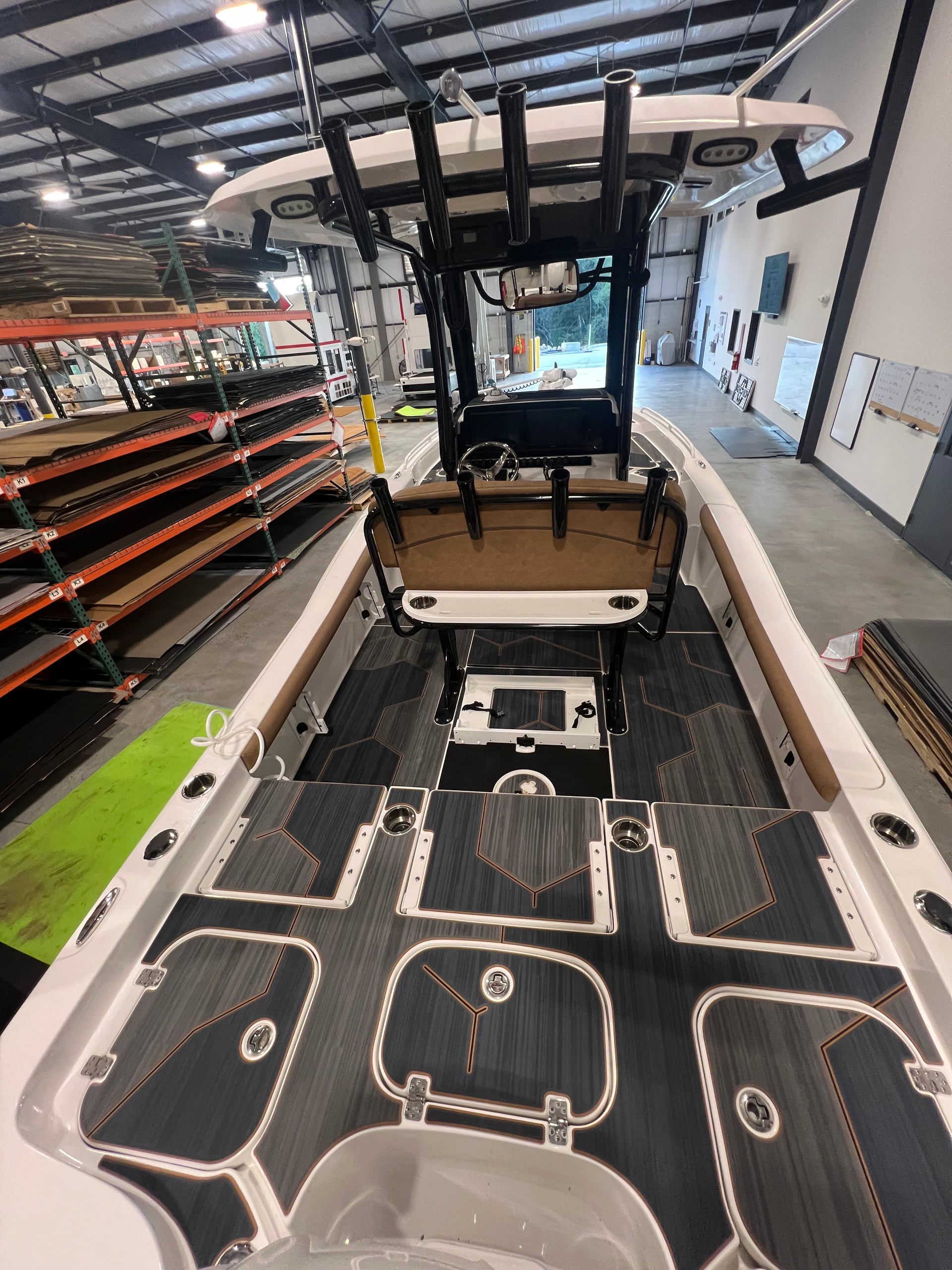 GatorStep deck panels being fitted on a boat in the Lenoir City shop