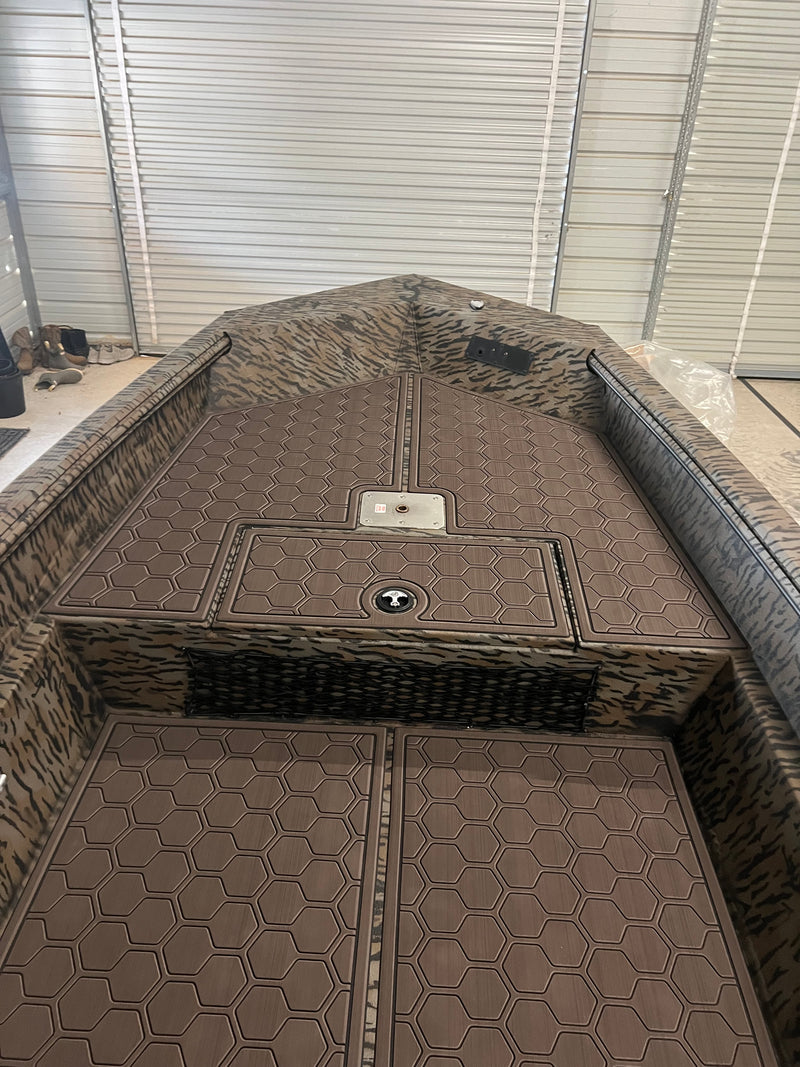 Brown GatorStep covering a bass boat deck and compartment lids