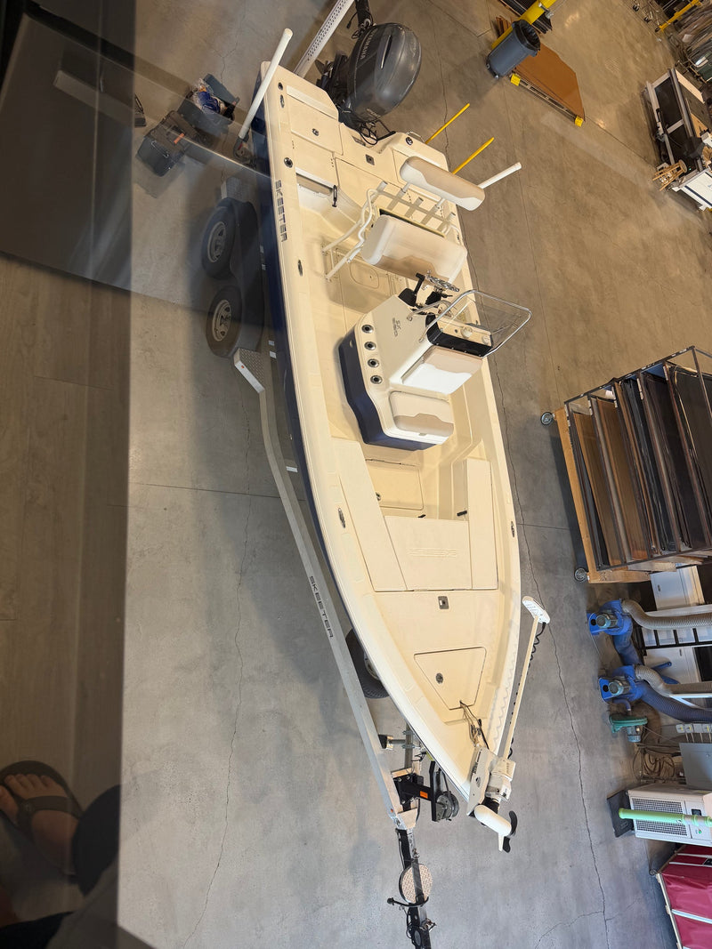 Before: worn factory deck on a center console fishing boat, ahead of a custom GatorStep flooring install — Lakebound Marine, Lenoir City TN