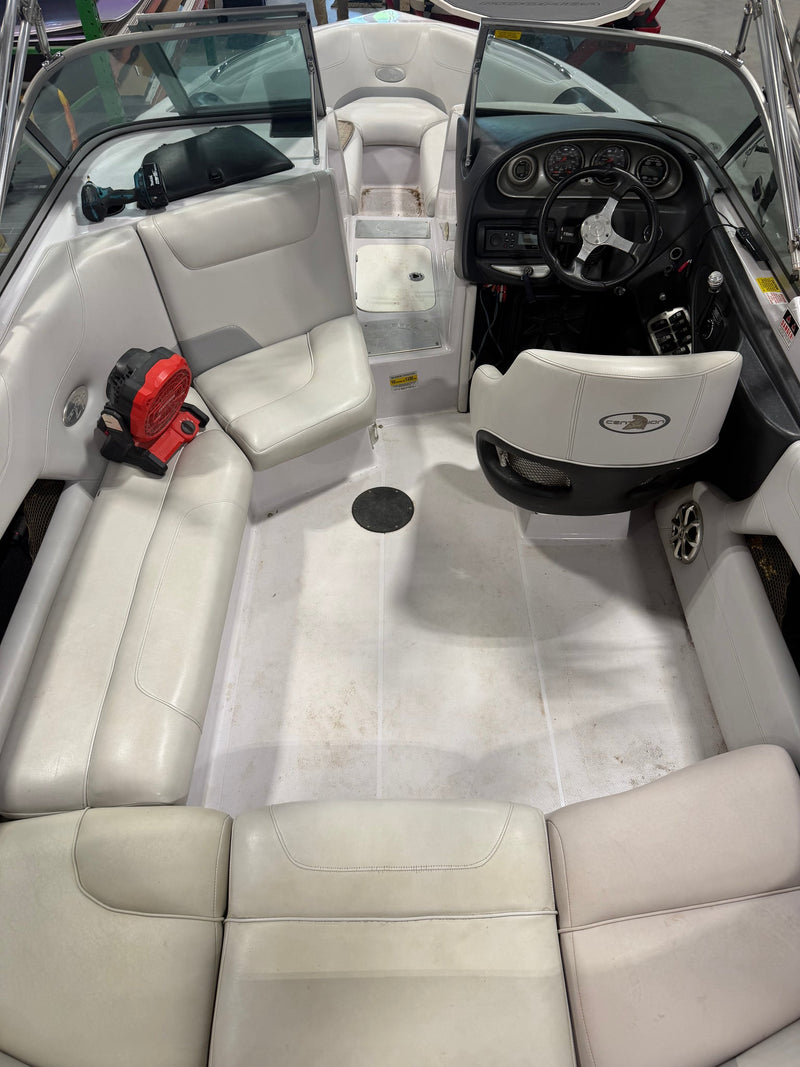 Before: bare factory cockpit floor in a Centurion wakeboat, ahead of a custom GatorStep flooring install — Lakebound Marine, Lenoir City TN
